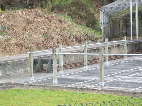 Narrow gauge track going through old tunnel