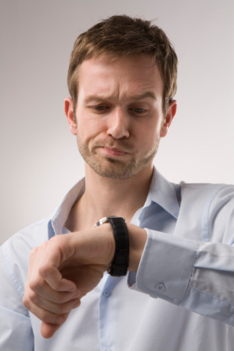 man looking at watch radius images1