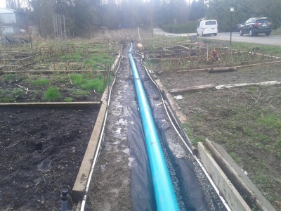 Community Garden Drainage Pipe Installation