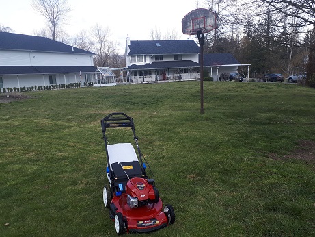 Mower Before Unmowed Grass