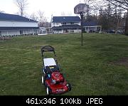 Mower Before Unmowed Grass