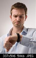 man looking at watch radius images1